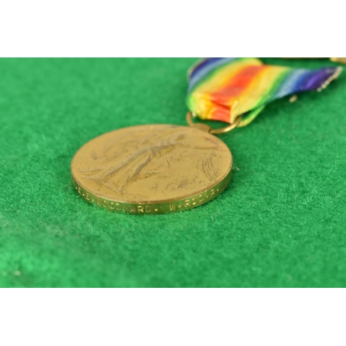 122 - A Single WWI Medal and Military Badge for No.235476 Pte G E Woodward, West Riding Regiment, With Pri... 