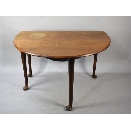 501 - A Mahogany Oval Topped Drop Leaf Dining Table, 121cms Wide