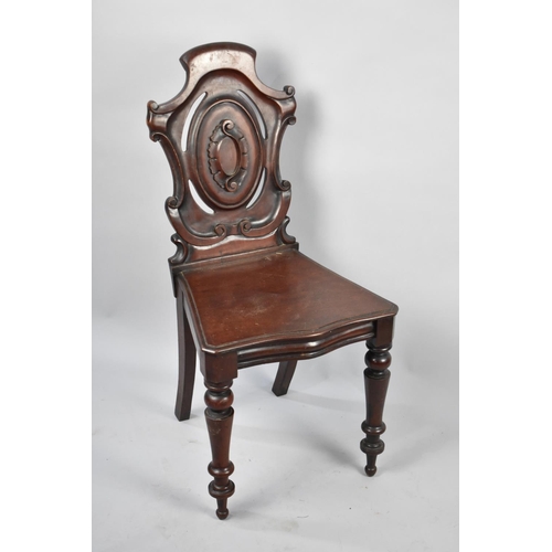 111 - A Late Victorian Mahogany Shield Back Hall Side Chair with Serpentine Front