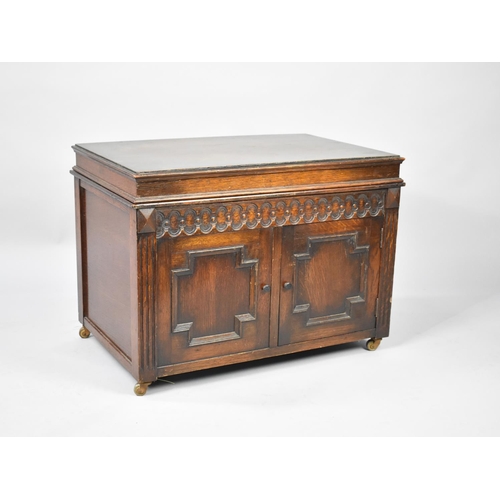 114 - An Early/Mid 20th Century Oak Coffer with Panel Front, 69cm wide