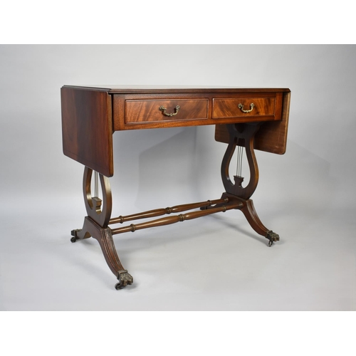 125 - A Reproduction Mahogany Drop Leaf Sofa Table with Two Drawers and Lyre Supports, 88cm Wide