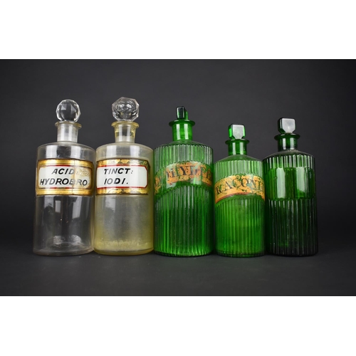 128 - A Collection of Various Late 19th/Early 20th Century Green and Plain Glass Chemists Bottles Together... 