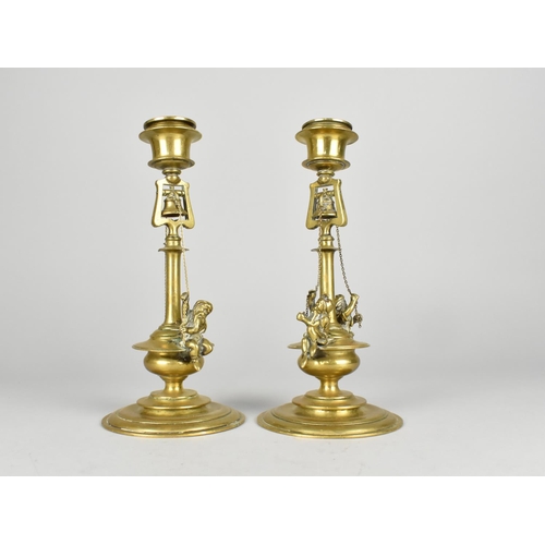 19 - A Pair of Brass Candlesticks, The Supports in the Form of Bell Towers with Two Dwarves Pulling Chain... 