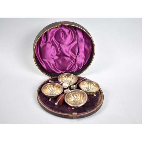 21 - A Victorian Cased Set of Four Salts and Three Spoons, Birmingham 1885, Circular Box AF