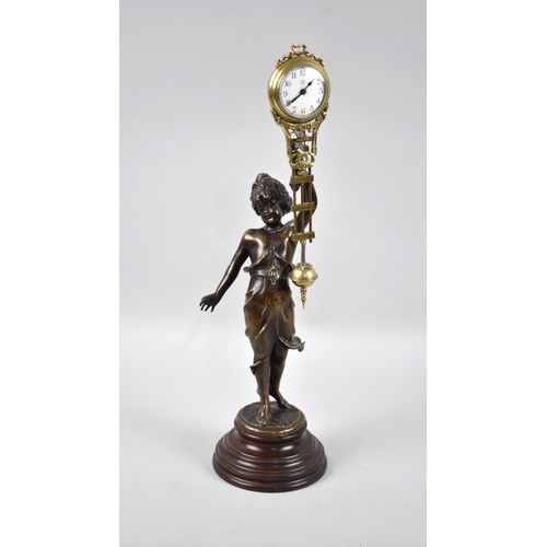 3 - A Reproduction Bronze Figural Mystery Clock, Movement Requires Attention