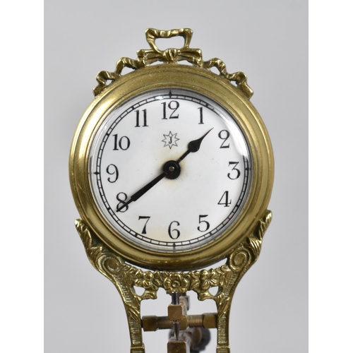 3 - A Reproduction Bronze Figural Mystery Clock, Movement Requires Attention