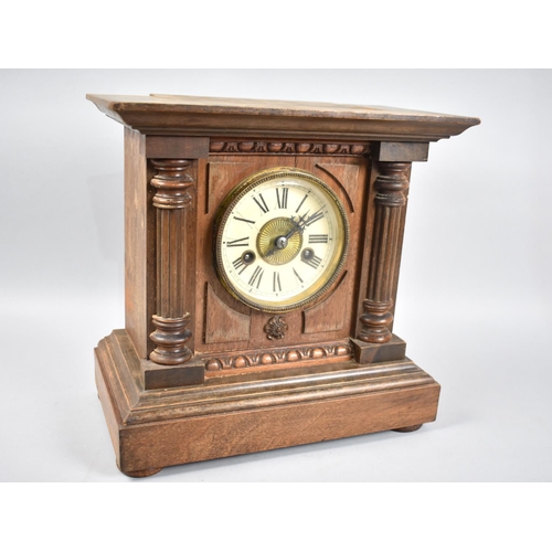 33 - A Late 19th / Early 20th Century Continental Mantel Clock of Architectural Form with Reeded Half Pil... 