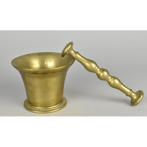 38 - A 19th Century Brass Pestle and Mortar, 12cm Diameter