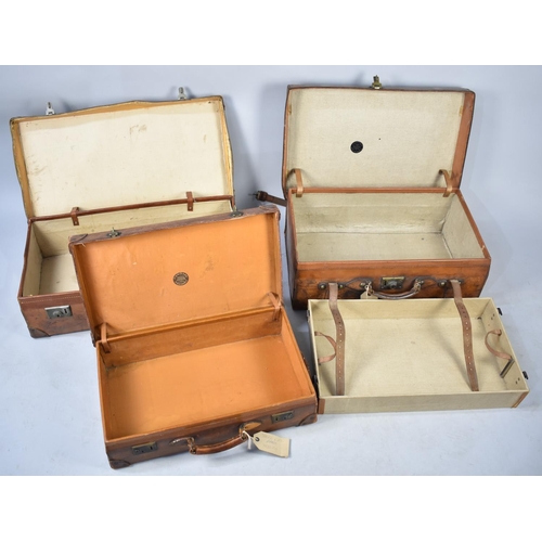 495 - A Collection of Three Vintage Graduated Leather Suitcases, Largest 76cm wide