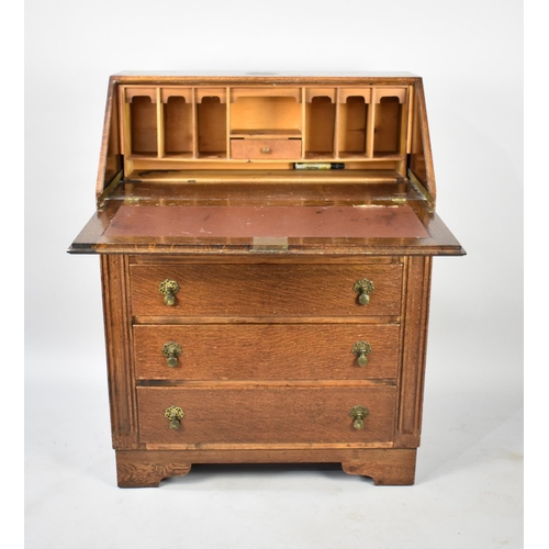 502 - A Mid 20th Century Oak Fall Front Bureau with Fitted Interior and Four Drawers to Base, 76cm wide