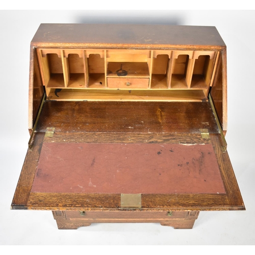 502 - A Mid 20th Century Oak Fall Front Bureau with Fitted Interior and Four Drawers to Base, 76cm wide