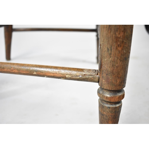 505 - An Edwardian Spindle Back Office Tub Chair