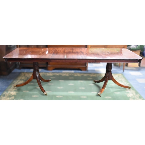 506 - A Reproduction Georgian Style Twin Pedestal Mahogany Extending Dining Table with One Extra Leaf, Ext... 