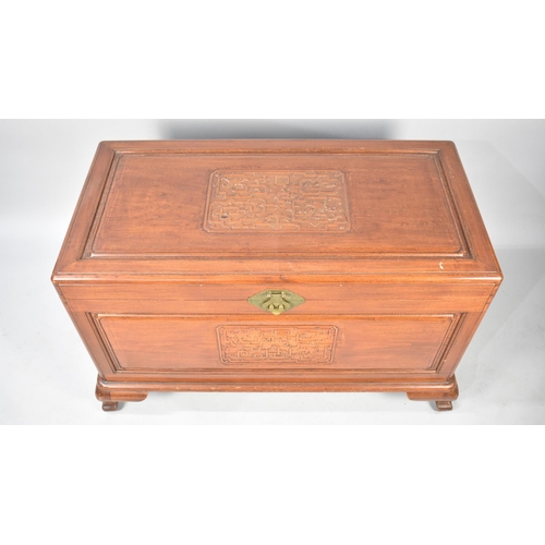 509 - A Camphor Wood Chest with Carved Panel to Hinged Lid and Front, 104cm wide