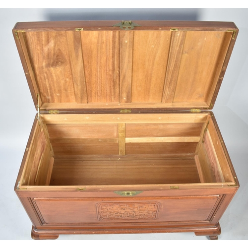 509 - A Camphor Wood Chest with Carved Panel to Hinged Lid and Front, 104cm wide