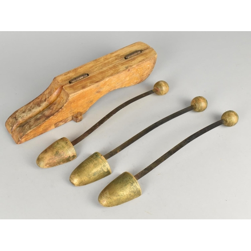 532 - A Vintage Folding Wooden Boot Pull and Three Shoe Stretchers