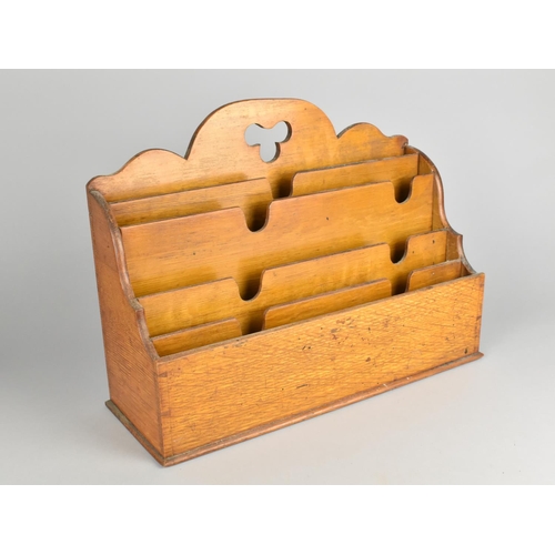 6 - An Edwardian Oak Desk Top Stationery Rack, 36cm Wide