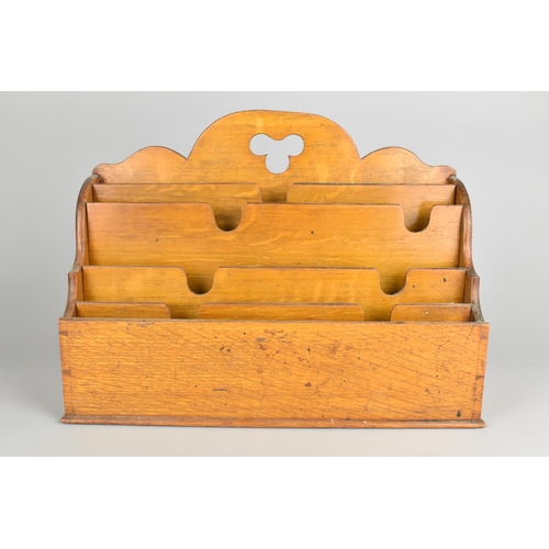 6 - An Edwardian Oak Desk Top Stationery Rack, 36cm Wide