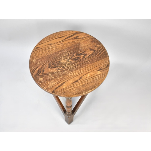 65 - A 20th Century Circular Oak Coffee Table with Cricket Style Supports, 44cm diameter