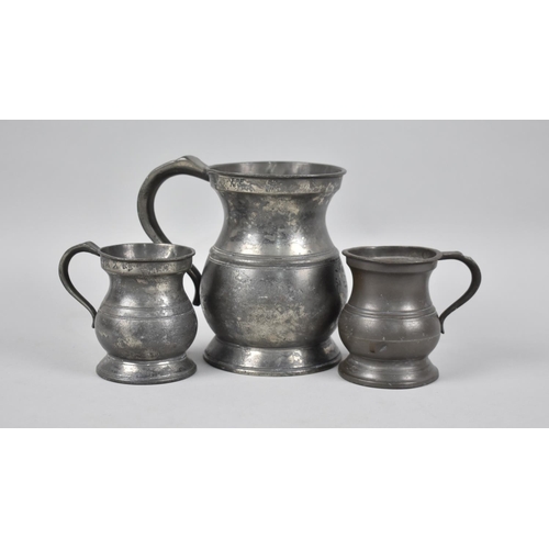 69 - A Collection of Three Unrelated Graduated Pewter Measures