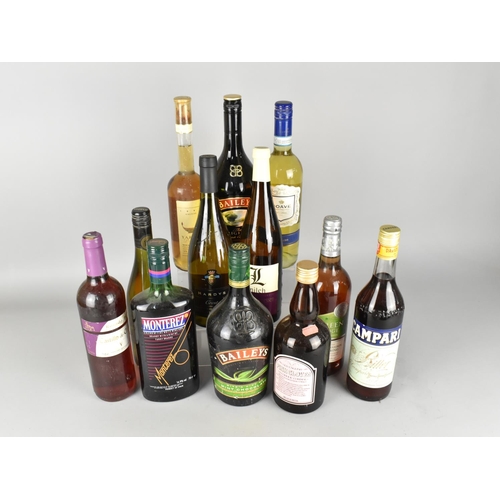 77 - A Collection of 12 Bottles of Mixed Wines and Spirits