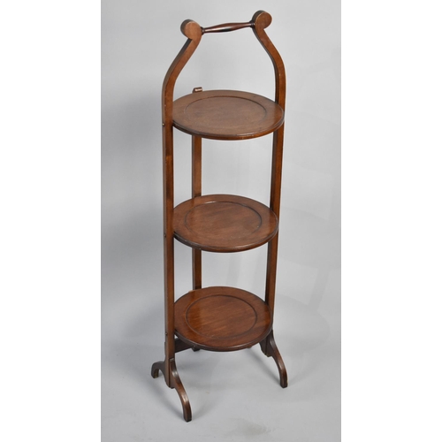 81 - An Edwardian Mahogany Three Tier Cake Stand, Bottom Hinge Requires Attention  89cm High