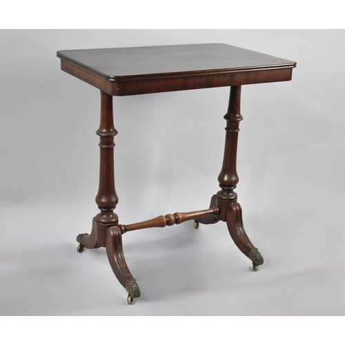 96 - A Mid 19th Century Mahogany Occasional Table with Turned Supports and Brass Casters, 66cm Wide