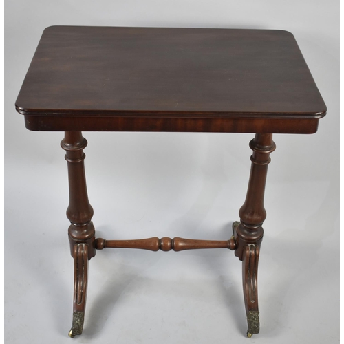 96 - A Mid 19th Century Mahogany Occasional Table with Turned Supports and Brass Casters, 66cm Wide