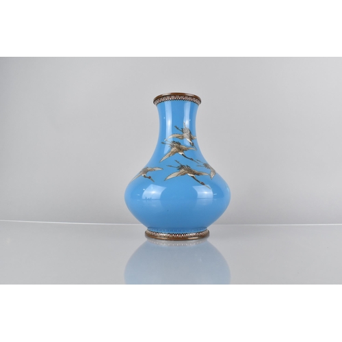 103 - A Japanese Enamel on Bronze Vase Decorated with Cranes in Flight on Blue Ground, 21cm High, Conditio... 