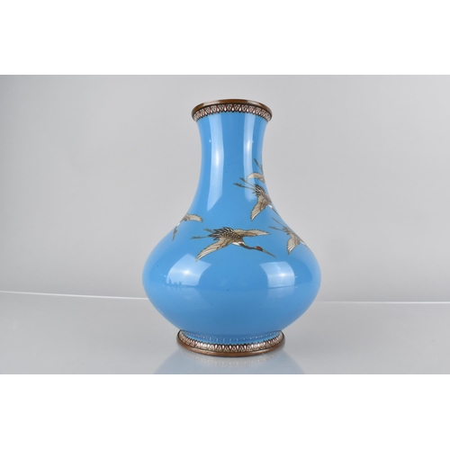 103 - A Japanese Enamel on Bronze Vase Decorated with Cranes in Flight on Blue Ground, 21cm High, Conditio... 