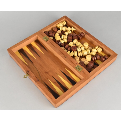 1 - A Modern Inlaid Burr Walnut and Specimen Wood Chess and Backgammon Games Box with Chess Set, 24cms W... 