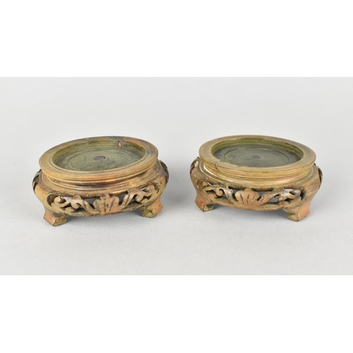 113 - Two Oriental Carved Wooden Circular Stands for 4.75cms Diameter Vases