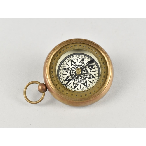 114 - A Reproduction Brass Cased Pocket Compass, Back plate Inscribed 