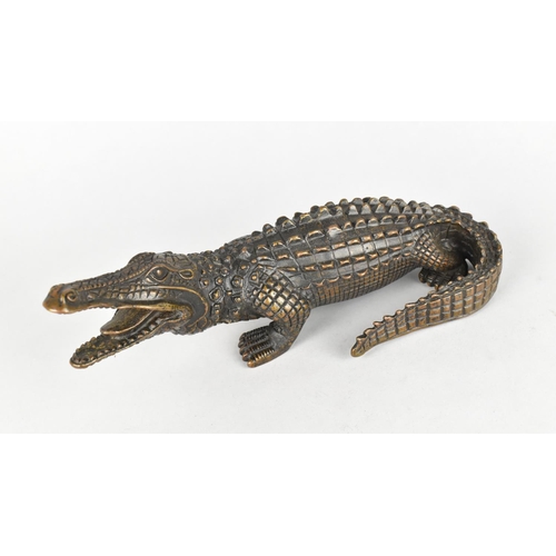 127 - A Patinated Bronze Study of an Alligator, 24cms Long