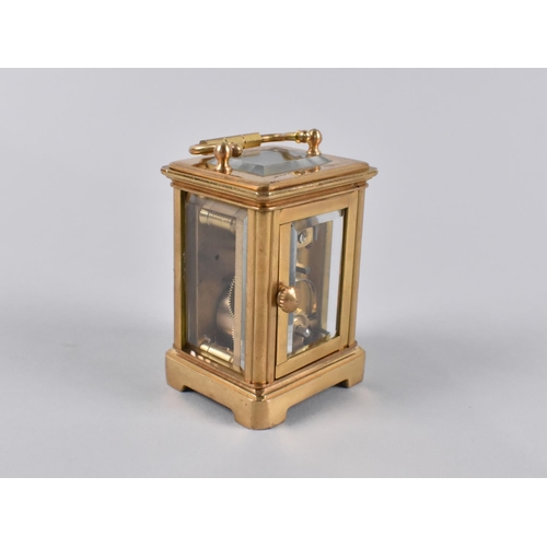 20 - A Reproduction Miniature Gilt Brass Cased Carriage Clock with White Enamel Dial, No Key but Working ... 