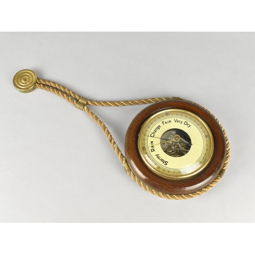 28 - A Mid 20th Century Wall Hanging Circular Aneroid Barometer with Rope Suspension, 15cms Diameter