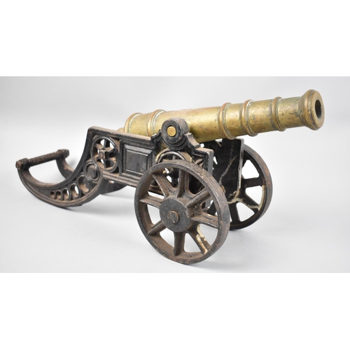 30 - A Large Cast Iron and Brass Model of a Spanish Cannon, 47cms Long