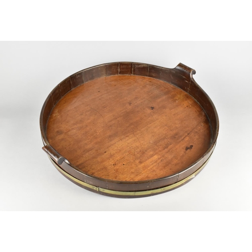 31 - A 19th Century Mahogany Circular Galleried Tray with Two Scrolled Handles and Brass Banding, 50cms D... 