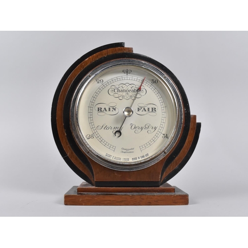 34 - An Art Deco Circular Free Standing Aneroid Barometer, 22cms Diameter