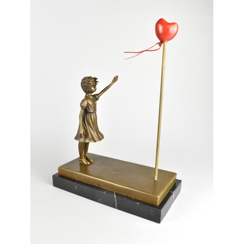 56 - A Modern Bronze and Marble Model Depicting The Famous Banksy Painting, 