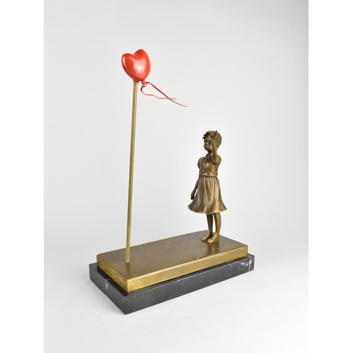 56 - A Modern Bronze and Marble Model Depicting The Famous Banksy Painting, 