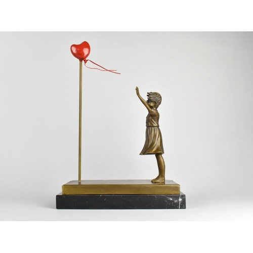 56 - A Modern Bronze and Marble Model Depicting The Famous Banksy Painting, 