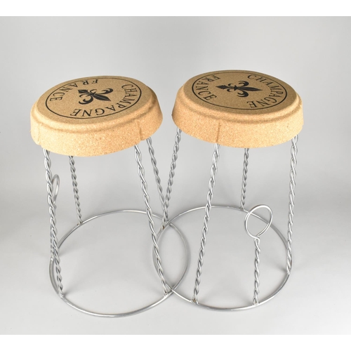 76 - A Pair of Modern Novelty Stools in the Form of Wired Champagne Corks, 29cms Diameter