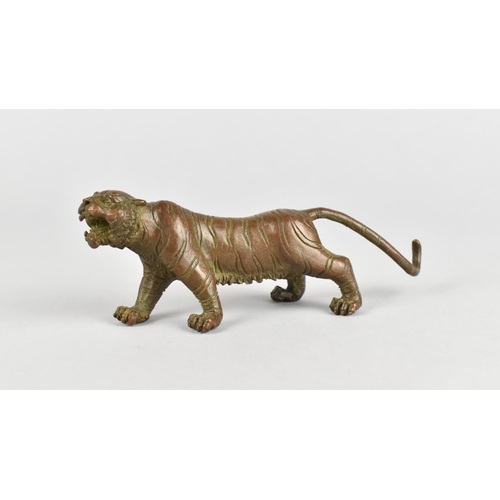 93 - A Bronze Patinated Study of a Tiger, 14cms Long