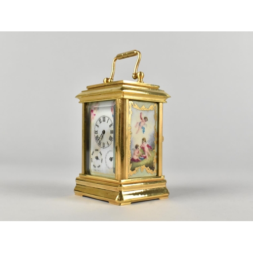 95 - A Reproduction Gilt Bronze Sevres Style Miniature Carriage clock, The Dial with Day and Date Indicat... 