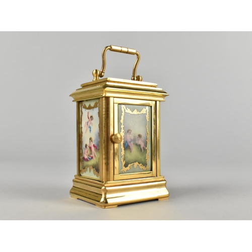 95 - A Reproduction Gilt Bronze Sevres Style Miniature Carriage clock, The Dial with Day and Date Indicat... 