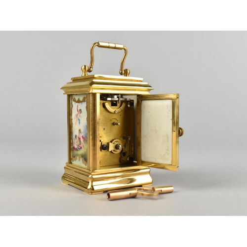 95 - A Reproduction Gilt Bronze Sevres Style Miniature Carriage clock, The Dial with Day and Date Indicat... 