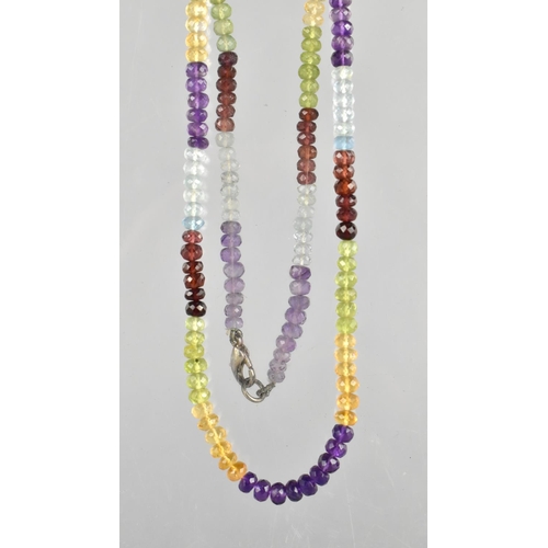 437 - A Gem Set Bead Necklace comprising Various Stone Beads to include Amethyst, Garnet, Citrine, Peridot... 