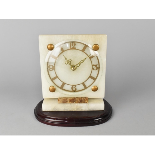 22 - An Art Deco Style Mantel Clock with Battery Movement, 18cms High