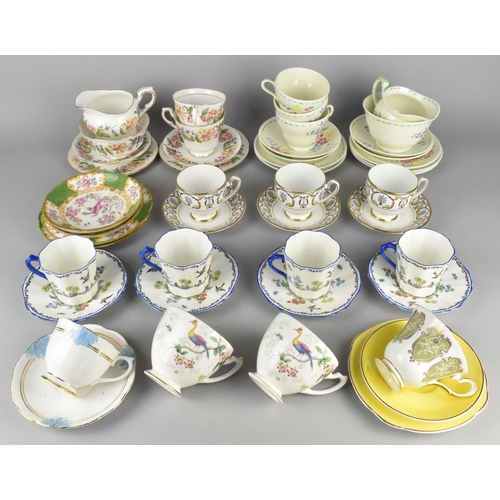 A Collection of Various Cups and Saucers to Include Examples by ...